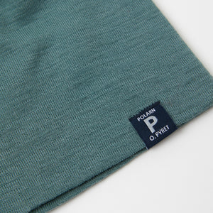 Merino Wool Green Kids Beanie Hat from the Polarn O. Pyret outerwear collection. Ethically produced kids outerwear.