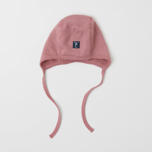 Merino Wool Pink Baby Helmet Hat from the Polarn O. Pyret outerwear collection. The best ethical kids outerwear.