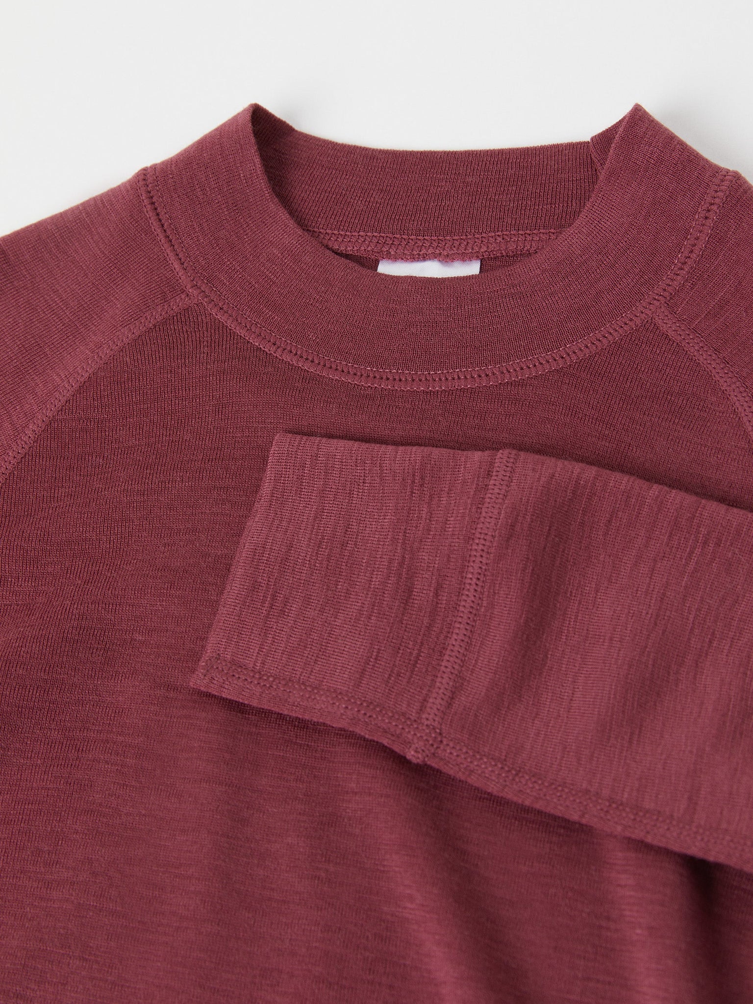 Red Merino Wool Kids Thermal Top from the Polarn O. Pyret outerwear collection. The best ethical kids outerwear.