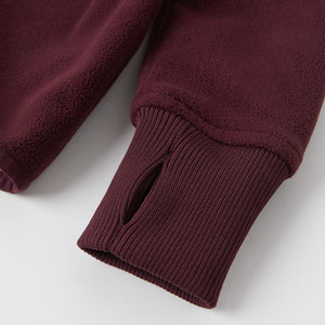 Burgundy Waterproof Kids Fleece Jacket from the Polarn O. Pyret outerwear collection. Ethically produced kids outerwear.
