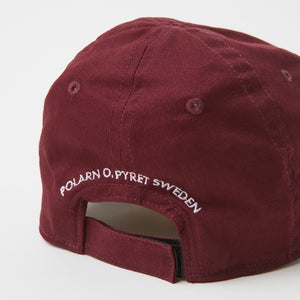 Burgundy Kids Baseball Cap from the Polarn O. Pyret outerwear collection. Ethically produced kids outerwear.