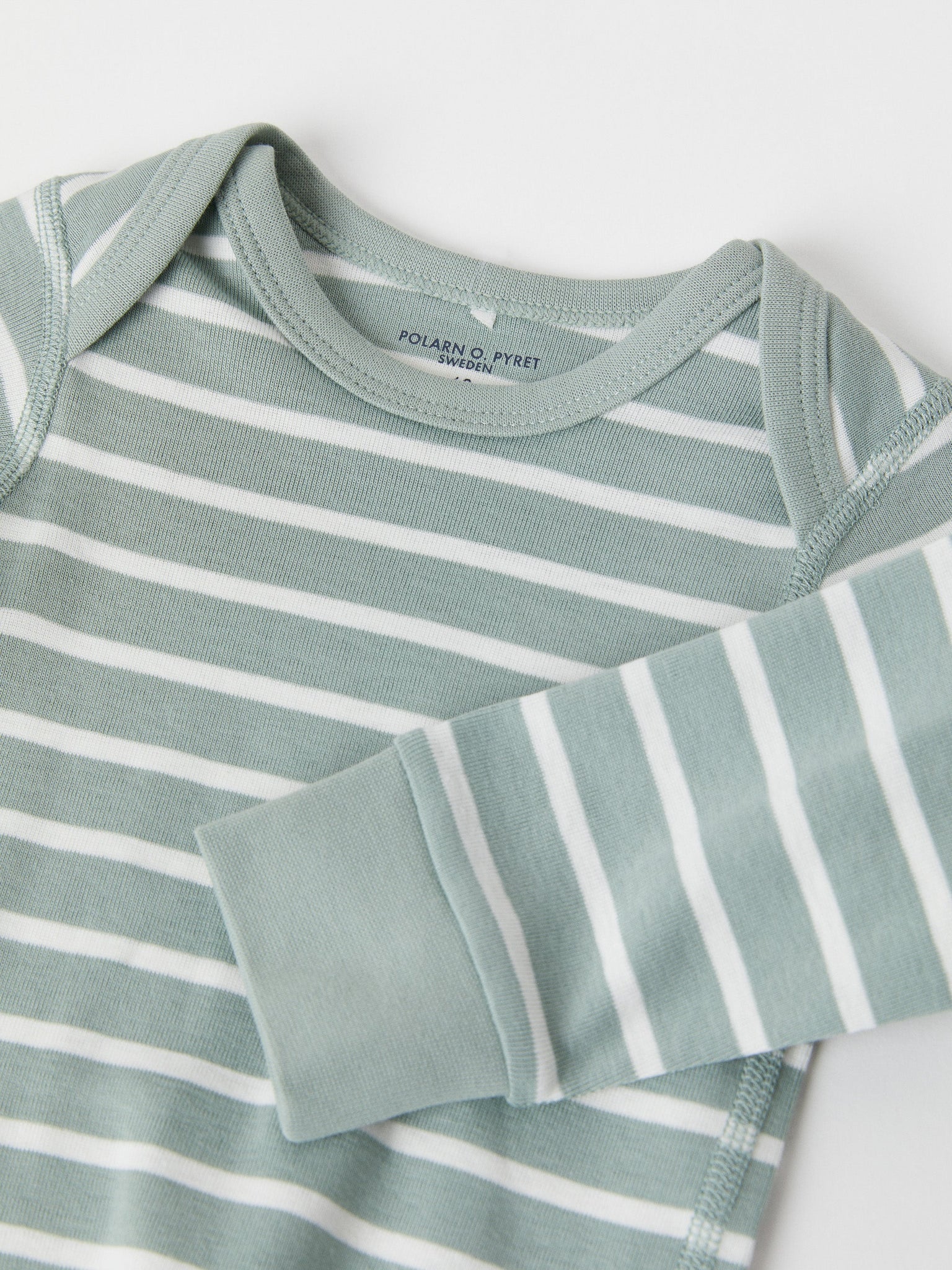 Organic Cotton Green Babygrow from the Polarn O. Pyret baby collection. Ethically produced baby clothing.