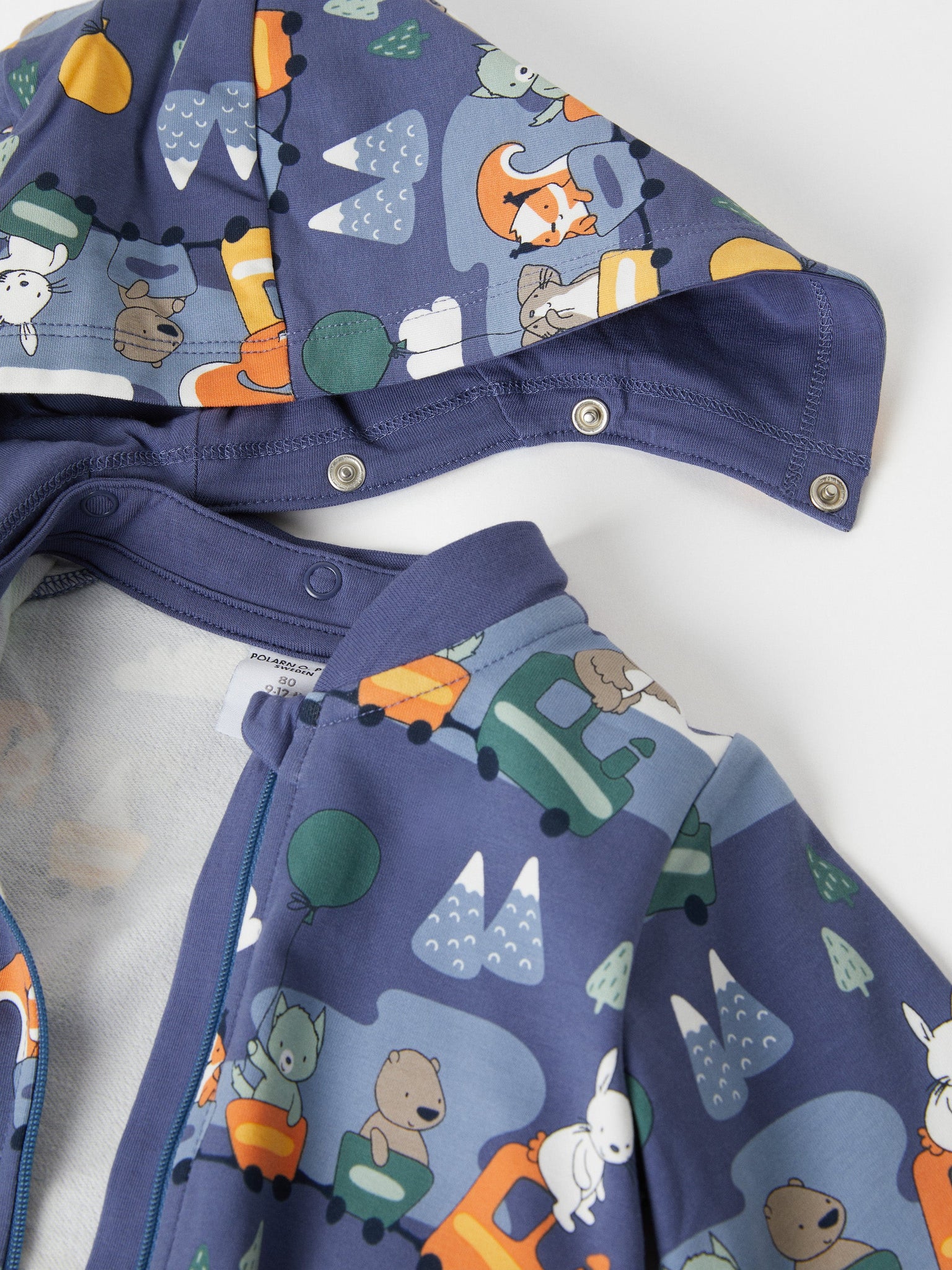 Animal Print Cotton Baby All-In-One from the Polarn O. Pyret baby collection. Nordic baby clothes made from sustainable sources.