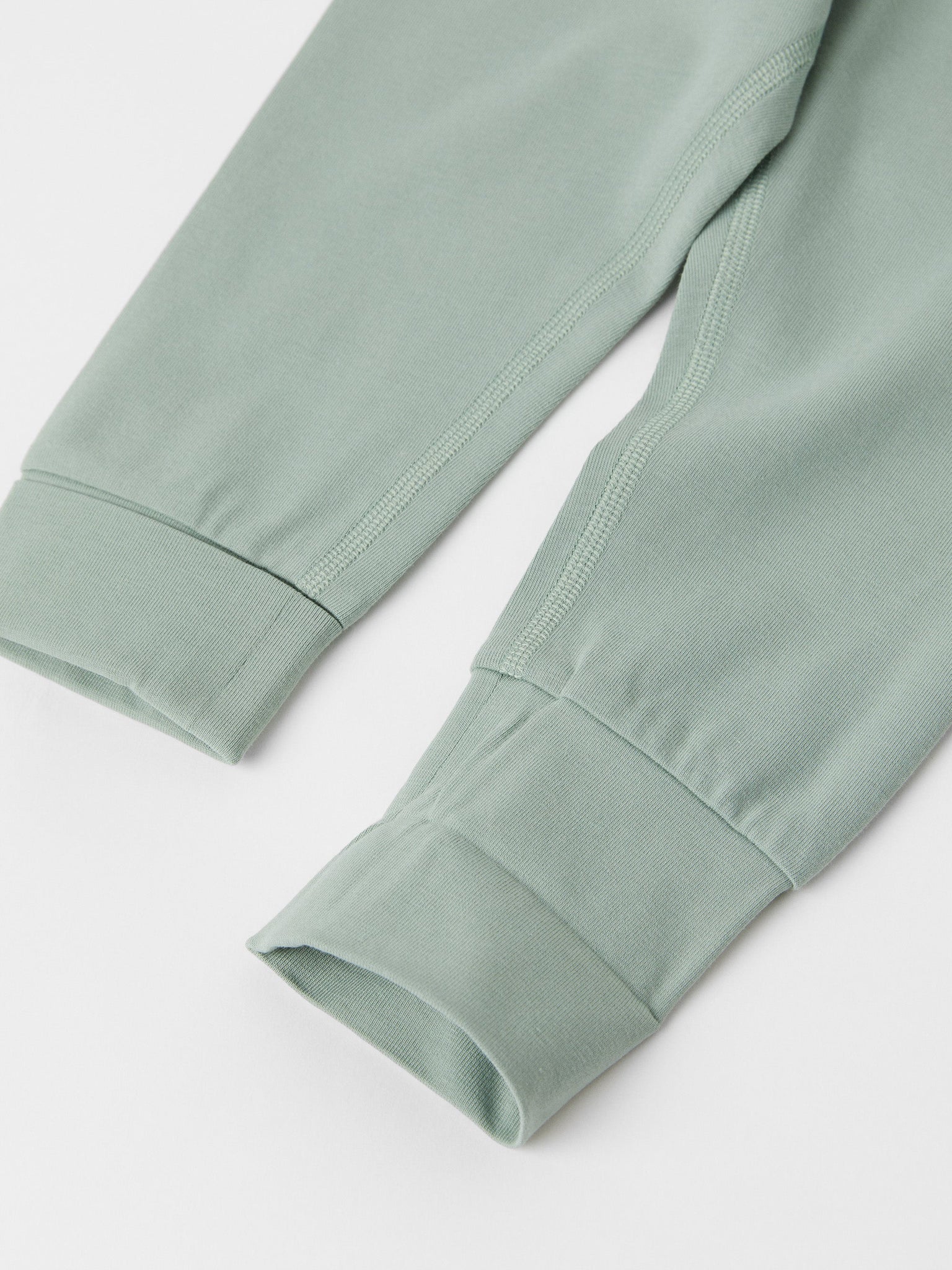 Organic Cotton Green Baby Leggings from the Polarn O. Pyret baby collection. Nordic baby clothes made from sustainable sources.