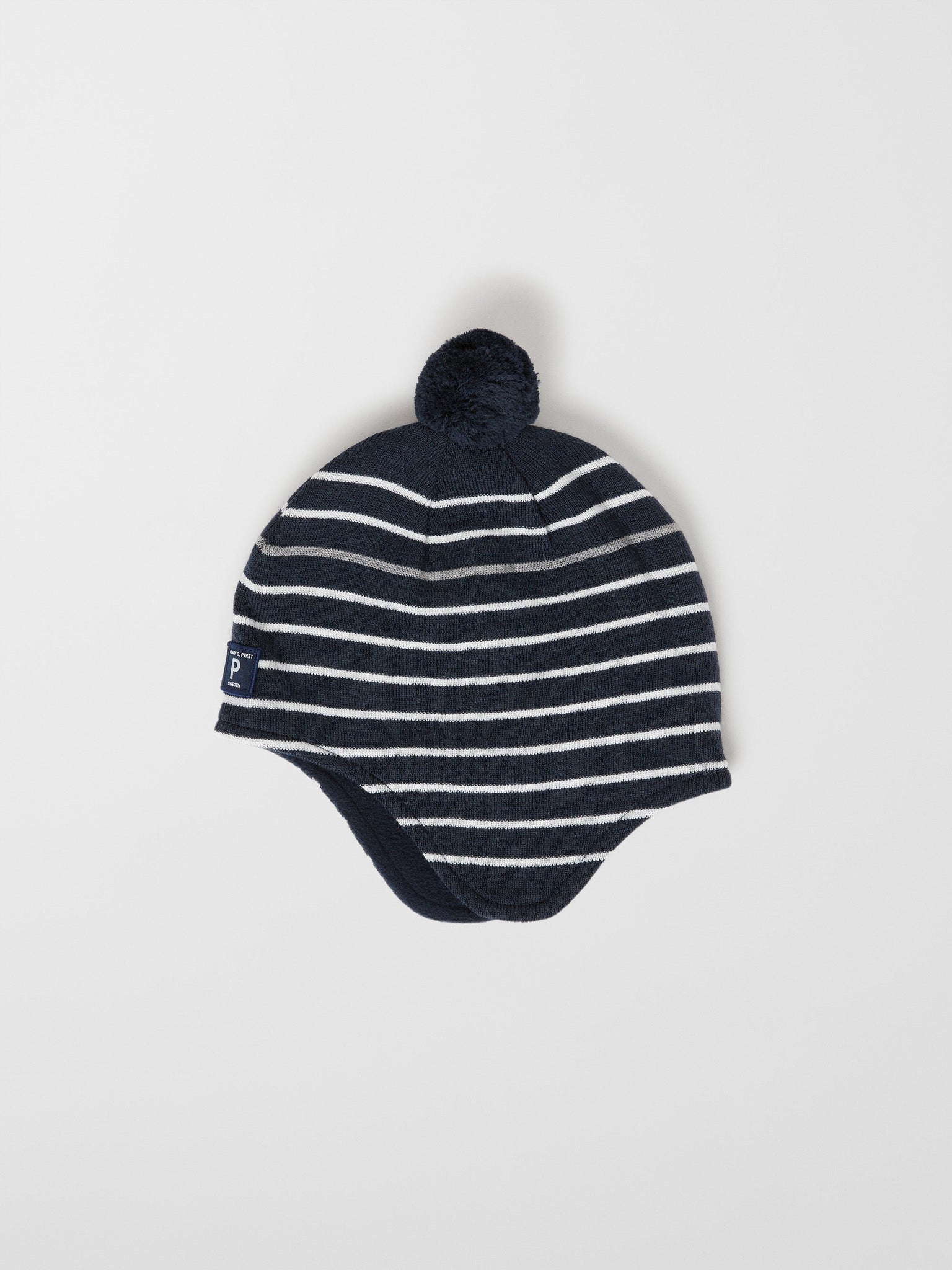 Merino Wool Navy Kids Bobble Hat from the Polarn O. Pyret outerwear collection. Ethically produced kids outerwear.