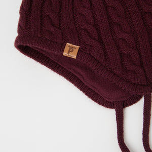 Burgundy Kids Wool Bobble Hat from the Polarn O. Pyret outerwear collection. Quality kids clothing made to last.