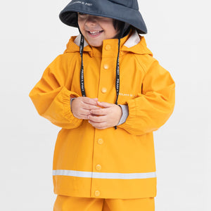 child wearing Waterproof Kids hat navy, durable, ethical unisex